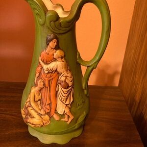 Artistic Green Ceramic Vase with Figures